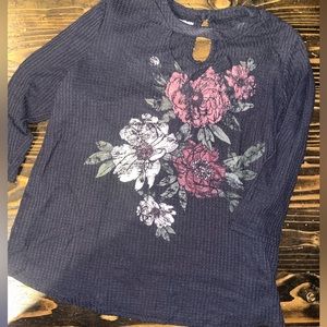 Maurice’s top black with flowers